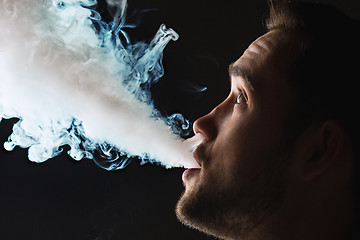 Image showing The face of vaping young man