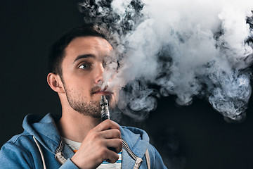 Image showing The face of vaping young man