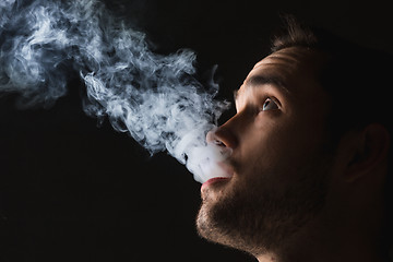 Image showing The face of vaping young man