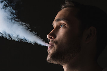 Image showing The face of vaping young man