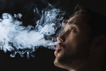 Image showing The face of vaping young man