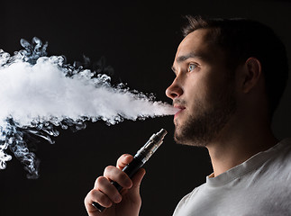 Image showing The face of vaping young man