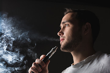 Image showing The face of vaping young man