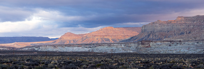 Image showing Storm Brewing Sun Hits Red Rock Walls Grand Staircase-Escalante 