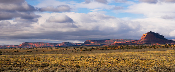 Image showing Storm Brewing Sun Hits Red Rock Walls Grand Staircase-Escalante 