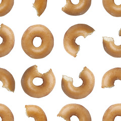 Image showing Seamless pattern of bites taken off a donut