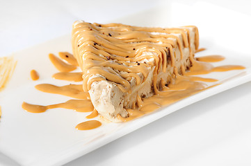 Image showing Delicious cheesecake with caramel topping