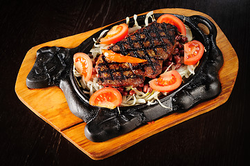 Image showing Beef steak with red beans garnish