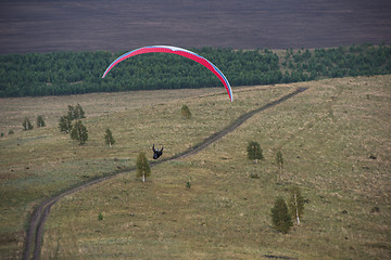 Image showing Paragliding in mountains