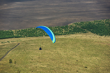 Image showing Paragliding in mountains