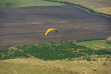 Image showing Paragliding in mountains