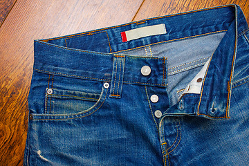 Image showing Unbuttoned jeans