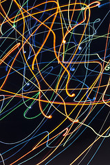 Image showing chaotic bright multicolored lines