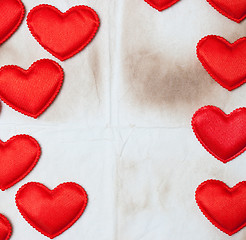 Image showing old paper background with red hearts