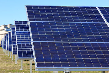 Image showing Row of Solar panels on a Field