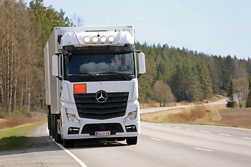 Image showing White Mercedes-Benz Actros Refrigerated Transport on the Move