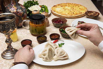 Image showing Man eating in georgian restaurant