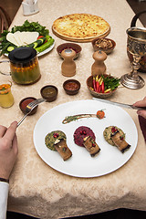 Image showing Man eating in georgian restaurant