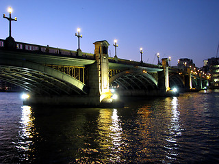 Image showing Lighted bridge at dusk