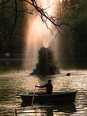 Image showing Paddling near an artesian fountain