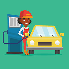 Image showing Worker filling up fuel into car.