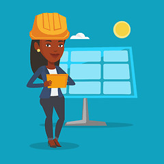 Image showing Female worker of solar power plant.