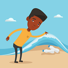 Image showing Man showing plastic bottles under sea wave.