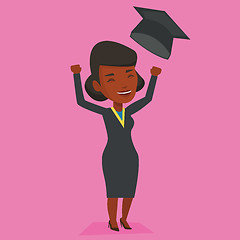 Image showing Graduate throwing up graduation hat.