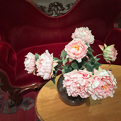 Image showing Vintage style interior with bouquet of roses