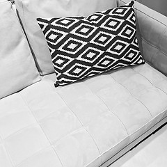 Image showing Black and white ornamental cushion on a sofa