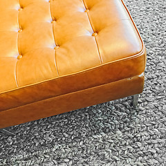 Image showing Leather seat on knitted wool carpet