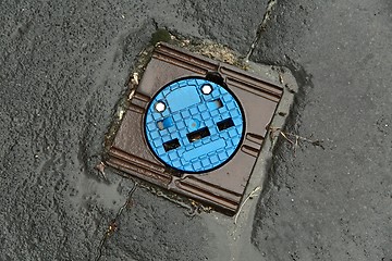 Image showing Sewer cover on a street