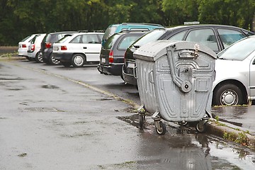 Image showing Garbage Containers in the Rain