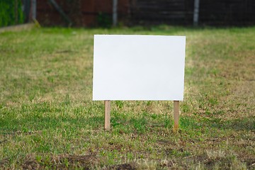 Image showing Empty sign on a land