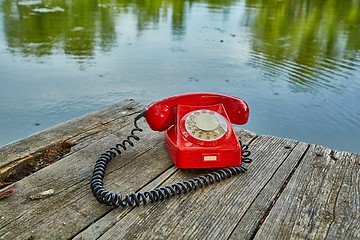 Image showing Old telephone in nature