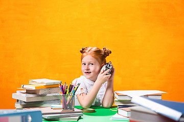 Image showing Teen girl with lot of books