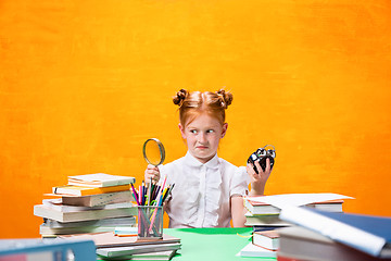 Image showing Teen girl with lot of books