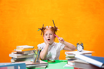 Image showing Teen girl with lot of books