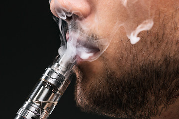 Image showing The face of vaping young man