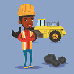 Image showing Miner with a big excavator on background.