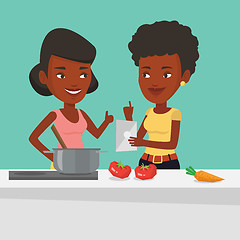Image showing Women cooking healthy vegetable meal.