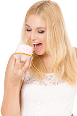 Image showing Woman eating sweet cake