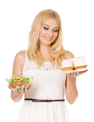 Image showing Woman with cake and vegetables