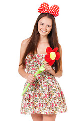 Image showing Teen girl with big flower