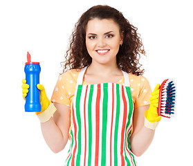 Image showing Housewife with cleaning supplies