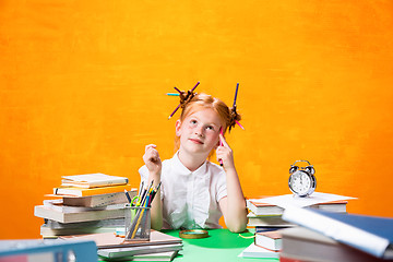 Image showing Teen girl with lot of books