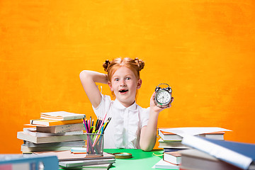 Image showing Teen girl with lot of books