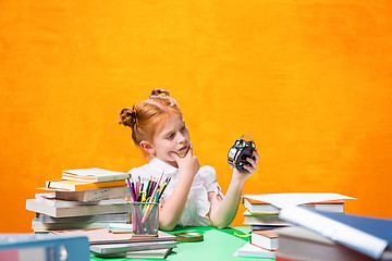 Image showing Teen girl with lot of books