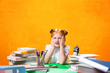 Image showing Teen girl with lot of books