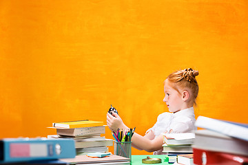 Image showing Teen girl with lot of books